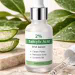 2% salicylic acid BHA serum bottle with dropper, aloe vera leaves in the background